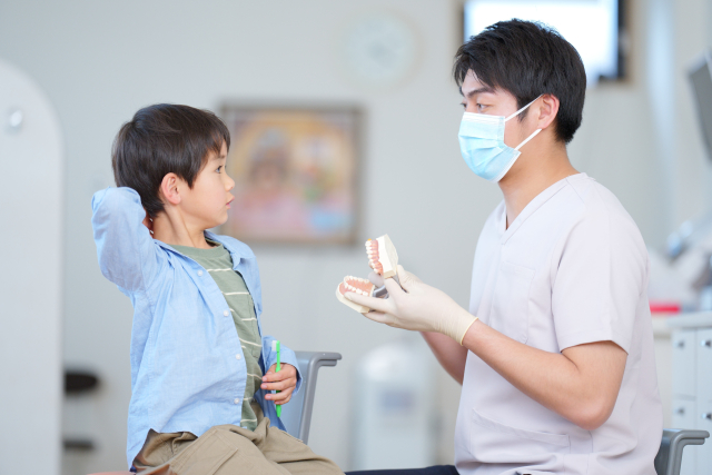怖がるお子さまを無理やり治療しない